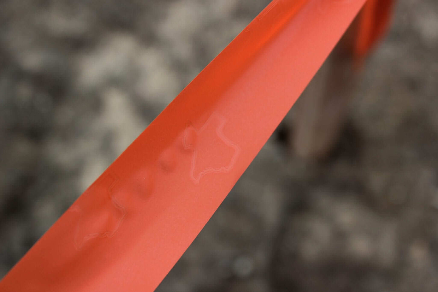 Presco Texas Flagging Tape PVC 1-3/16in x 150ft - in use field2 - Orange Glo TXOG